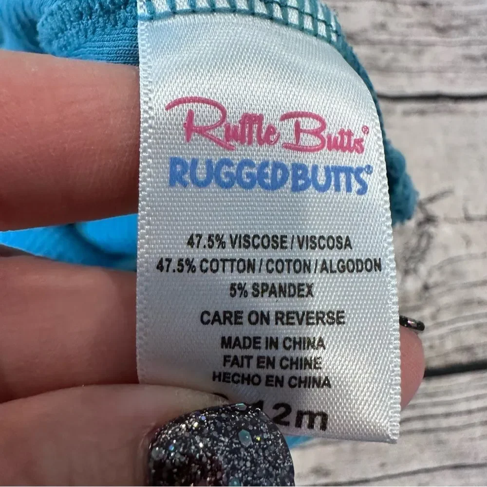 Lot of 2 Ruffle Butts/Rugged Butts Teal Ribbed Onesies; 1 Henley, 1 Ruffled 6-12